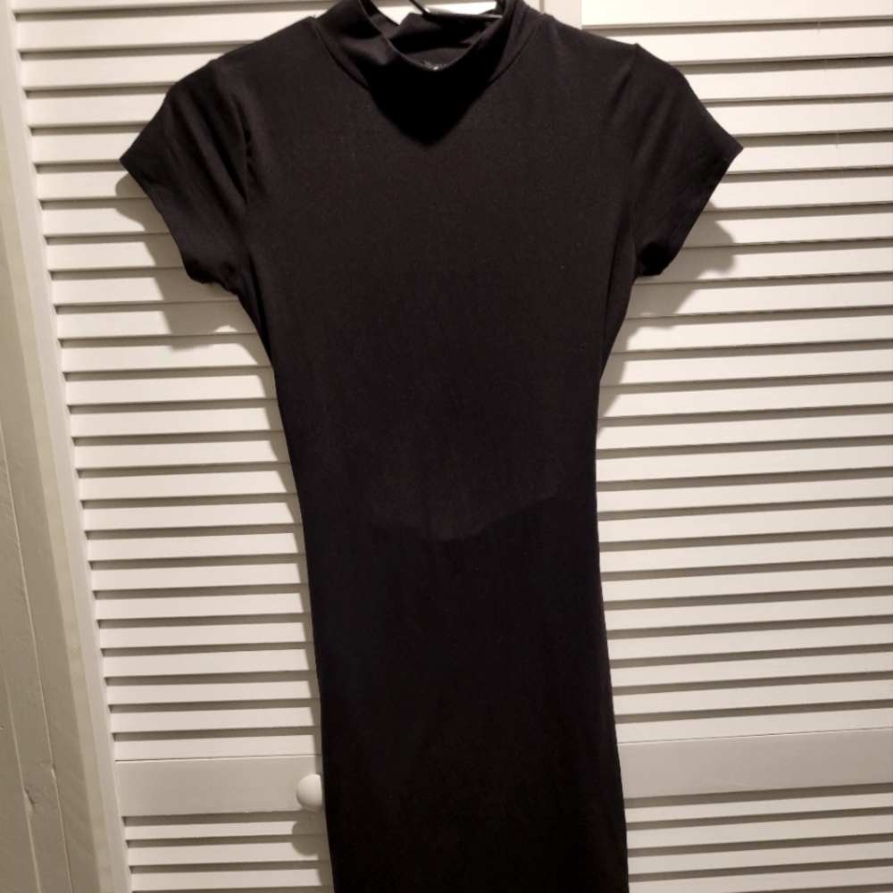 Cute "Little Black Dress" With cut-out.